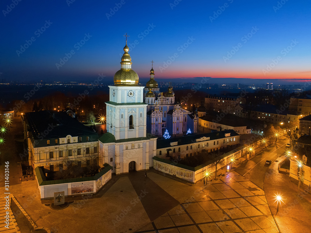 Evening down the golden domes of St. Michael's Cathedral, the eternal movement died down in the square,