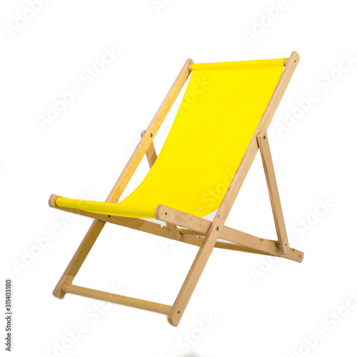 Valokuvatapetti Yellow wooden folding chair isolated on white