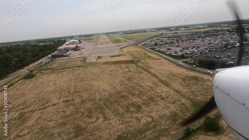 Airplane Landing Jet In Airport photo