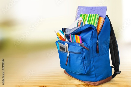 Blue School Backpack on background..