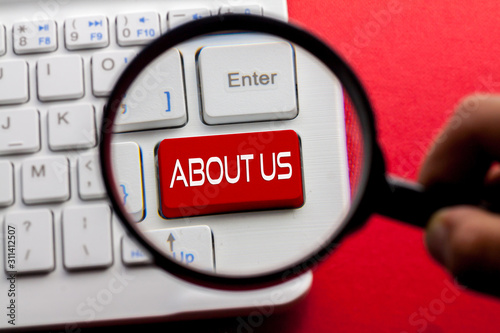 Wallpaper Mural ABOUT US word written on keyboard view with magnifier glass Torontodigital.ca