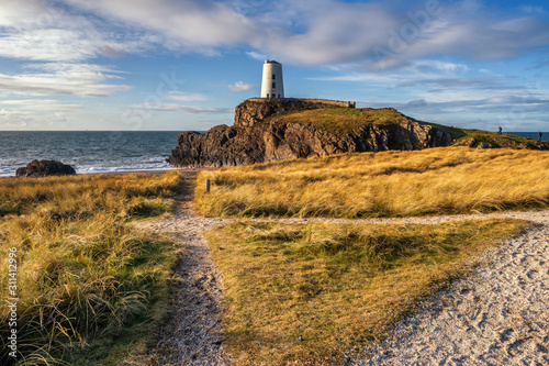 Tŵr Mawr lighthouse, on Ynys Llanddwyn on Anglesey, Wales, marks the western entrance to the Menai Strait