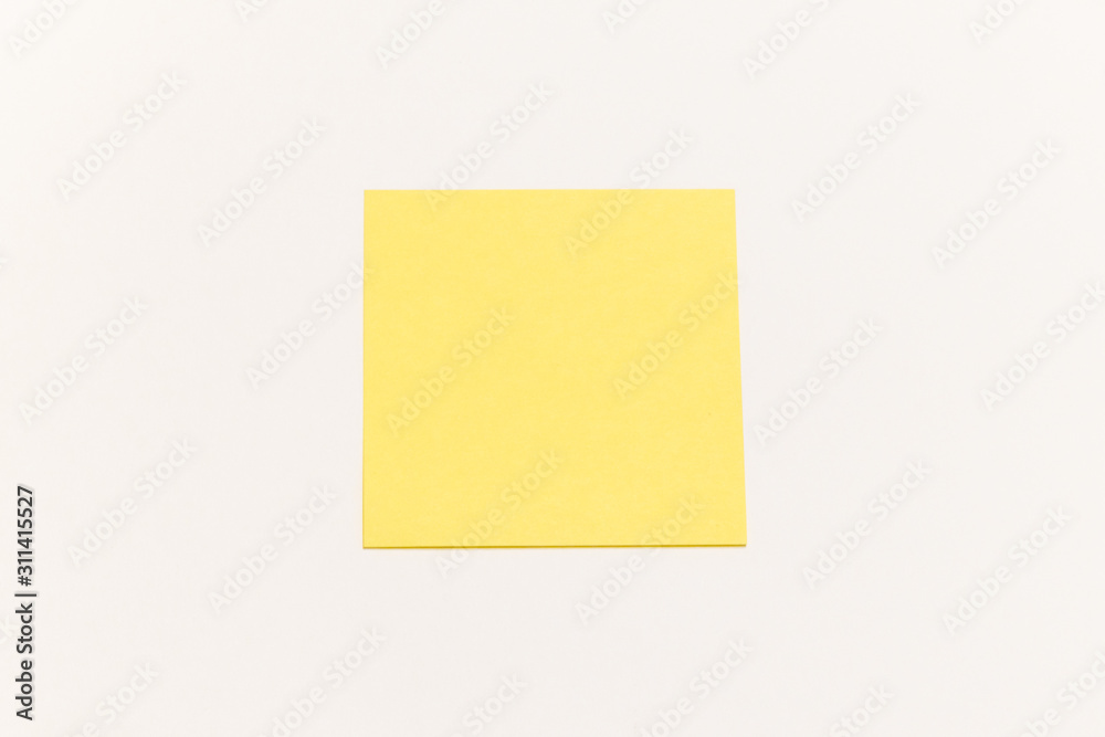 One empty yellow sticker on white background with place for text