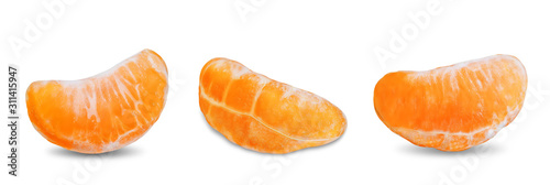 Tangerine fruit with slices, peel and leaves on a white isolated background
