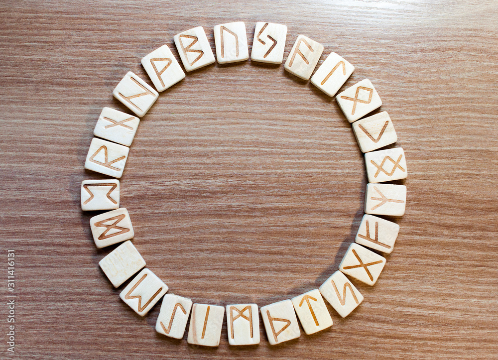 Circle of magical ancient wooden runes. Place for text. Copy space. Divination. Prediction. Rituals. Future Circle of magical ancient wooden runes. Place for text. Copy space. Divination. Prediction. Rituals. Future