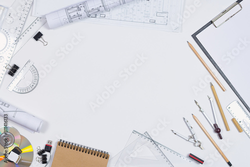 Architectural plans, pencil and ruler on the table. Place for your text