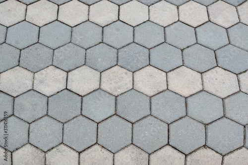 Large gray paving slabs close up. background