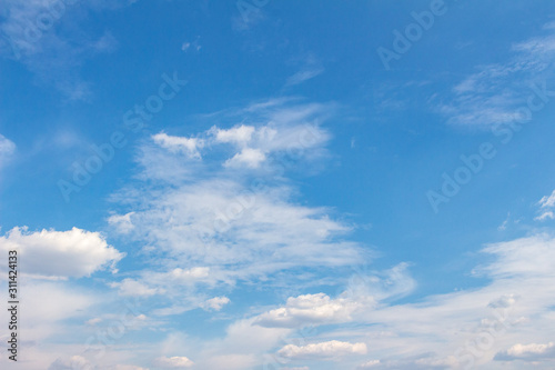 White clouds in the blue sky. Background. Texture