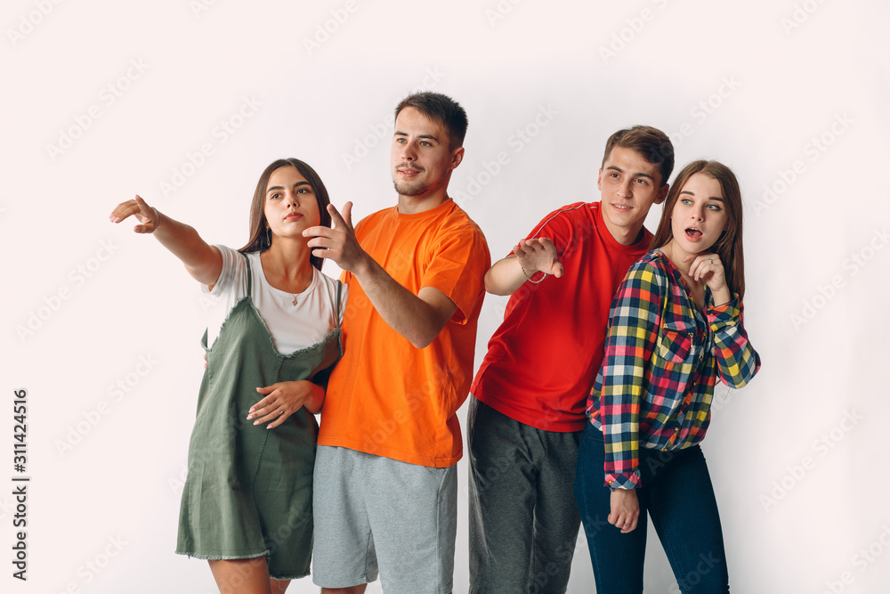 Company of young people man and woman. Isolated on white background. Company of young people man and woman. Isolated on white background.