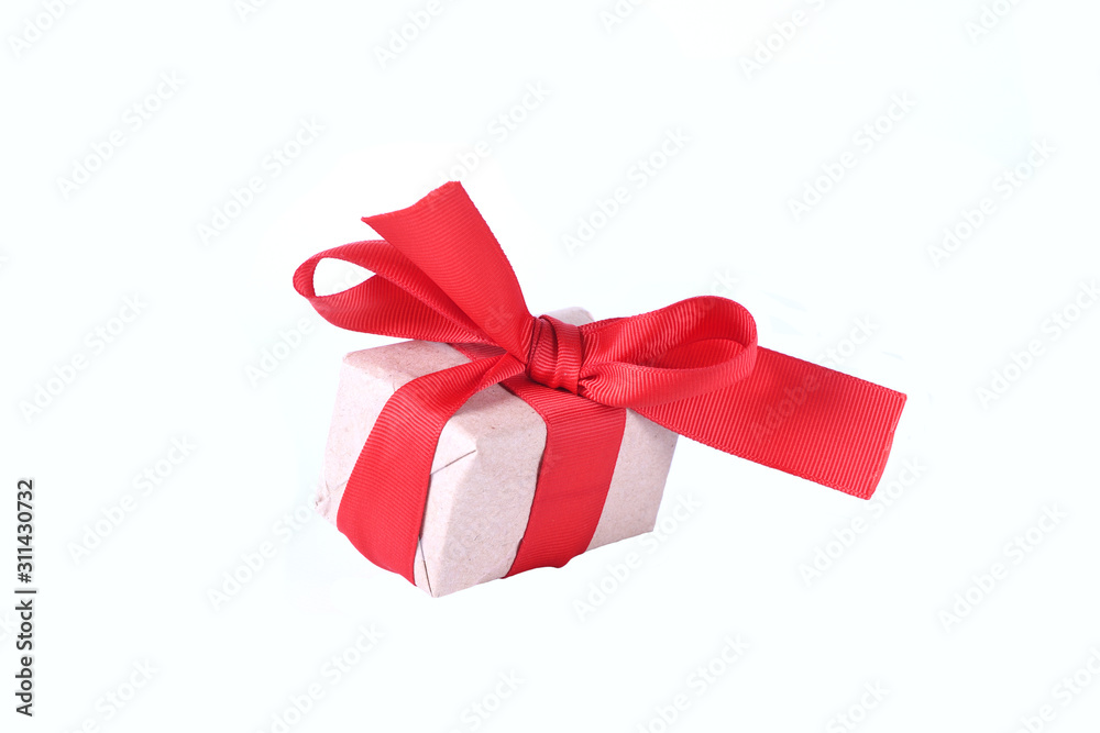 New Year's or Valentine's Day gifts boxes tied with red ribbon isolated on a white background New Year's or Valentine's Day gifts boxes tied with red ribbon isolated on a white background