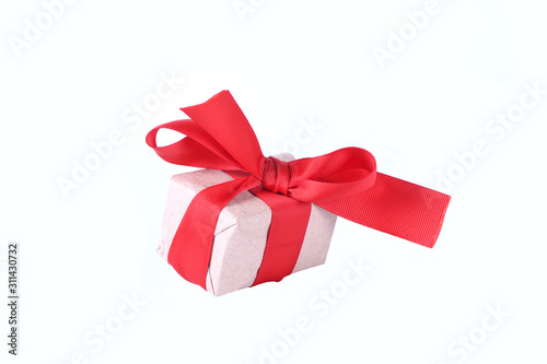 New Year's or Valentine's Day gifts boxes tied with red ribbon isolated on a white background