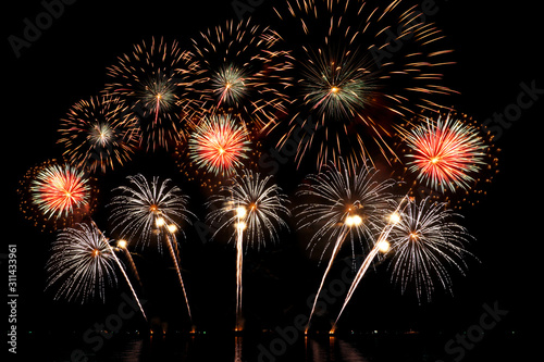 abstract fireworks on black background for event or Happy New Year celebration