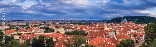 View of Prague from the observation deck near the walls of Prague Castle. View of the red roofs of Prague. Czech Republic