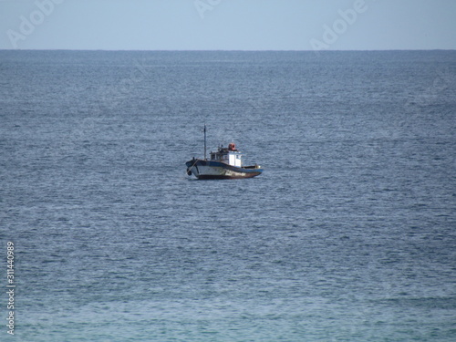 Fishing boat. Calm sea, cold water, suitable for squid fishing.