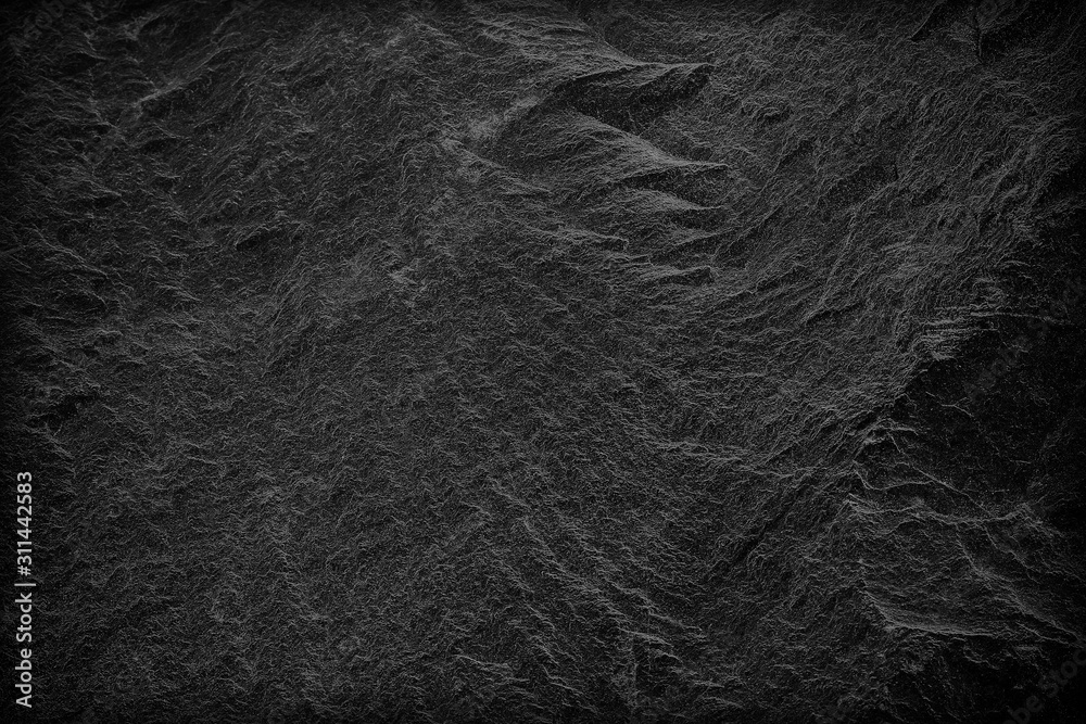 Fototapeta premium Dark grey black slate background or texture. black stone