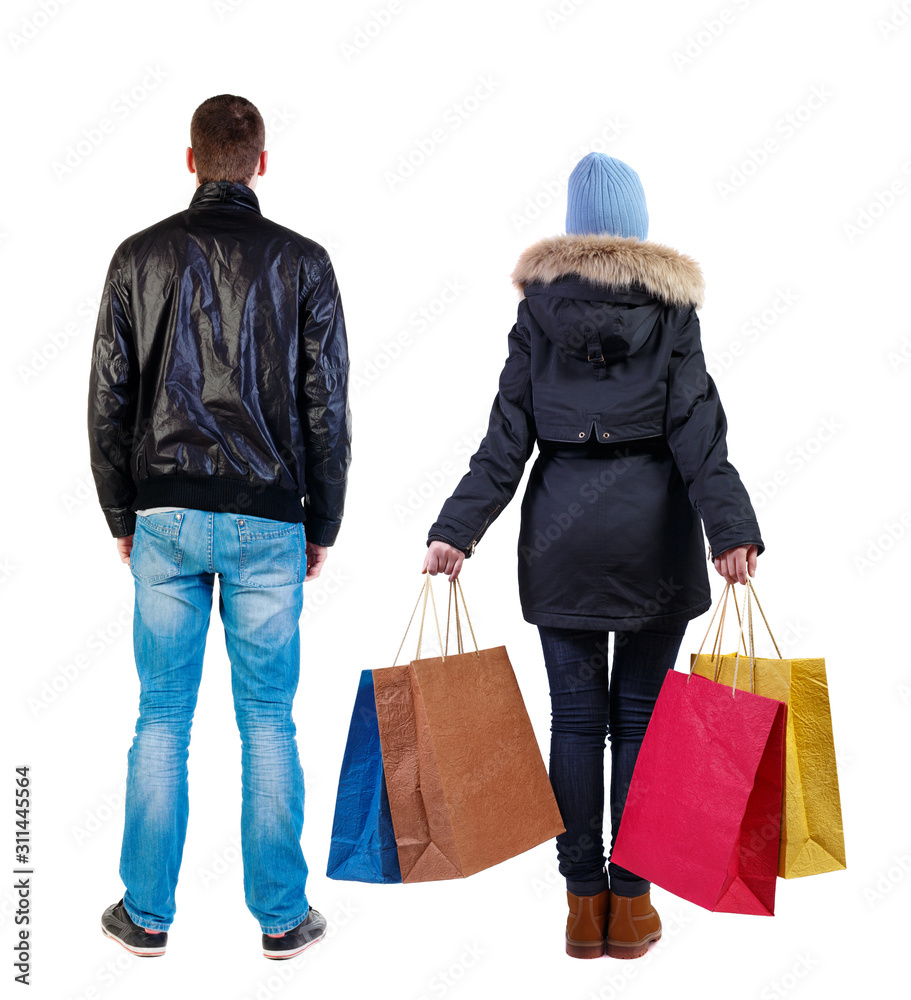 back view of couple with shopping bags back view of couple with shopping bags