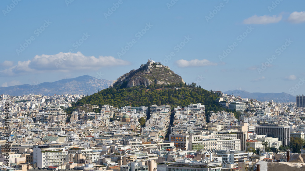 Aerial panorama of the Lycabettus Hill and city from Acropolis. It is a Cretaceous limestone hill in Athens, Greece.
