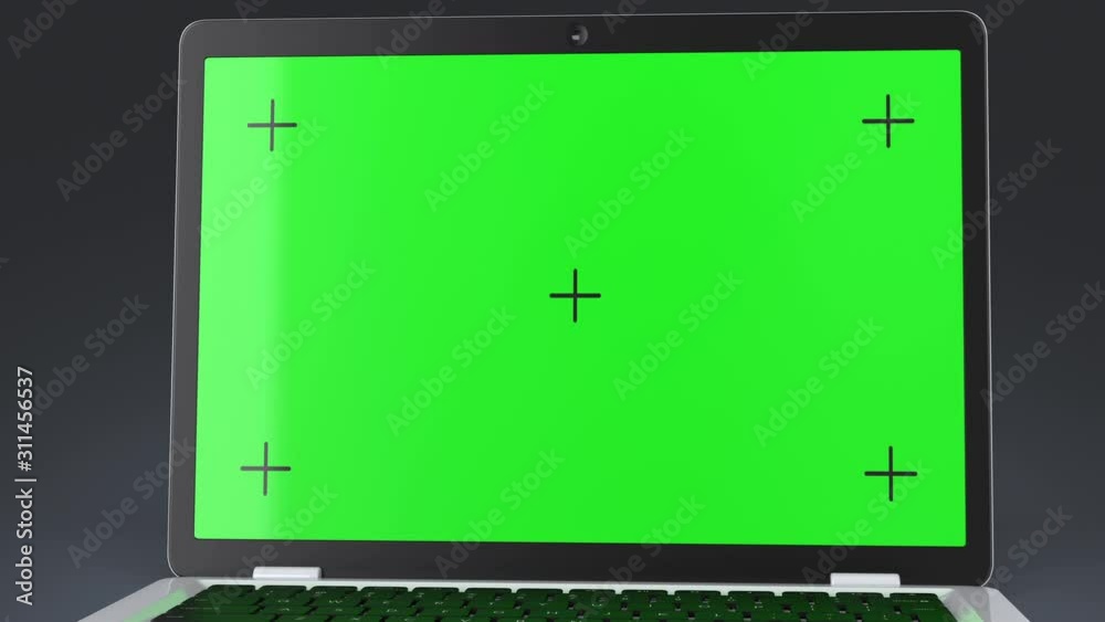 Modern laptop with green screen isolated on gray background. Video with alpha channel Modern laptop with green screen isolated on gray background. Video with alpha channel