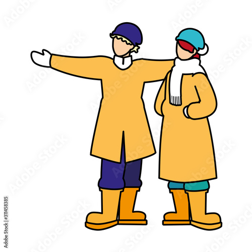 couple of people standing with winter clothes on white background