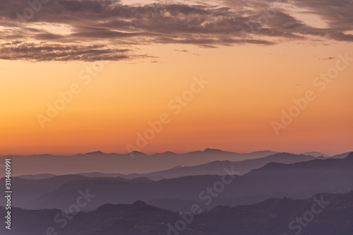 Sunrise over Purple Foothills in Pokhara Nepal © mikespixels