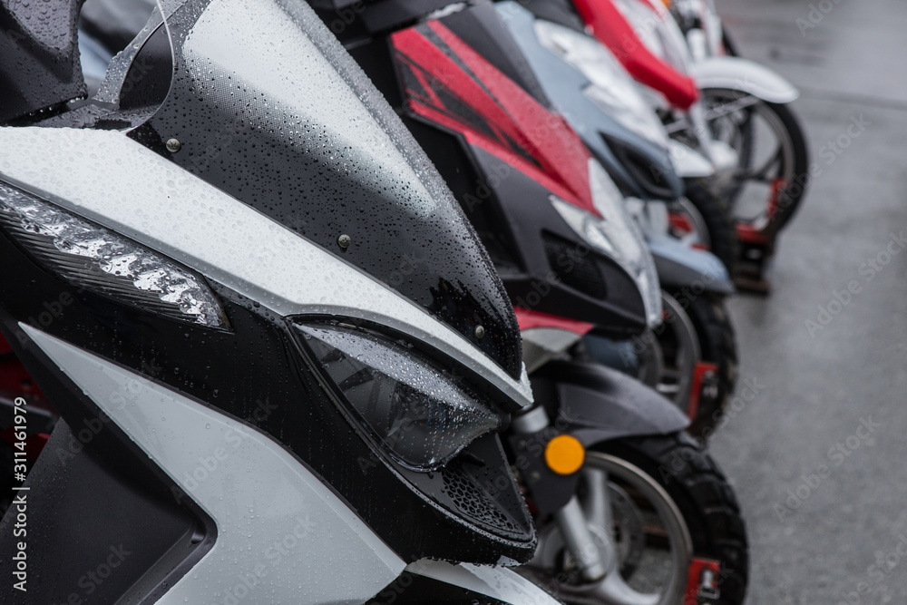 Scooters on parking on asphalt Scooters on parking on asphalt