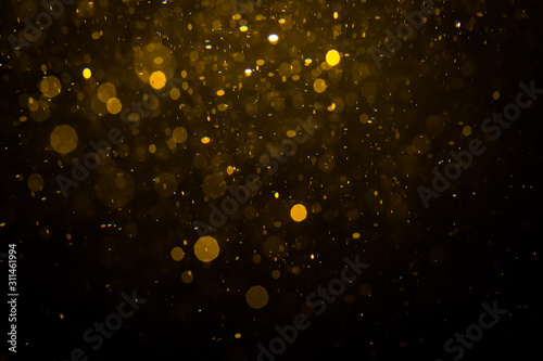 Abstract gold bokeh with black