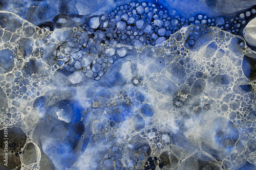 Abstract watercolor textures in blue, white and black