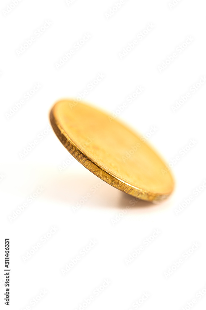 The antique aged golden coin with history on scratch The antique aged golden coin with history on scratch
