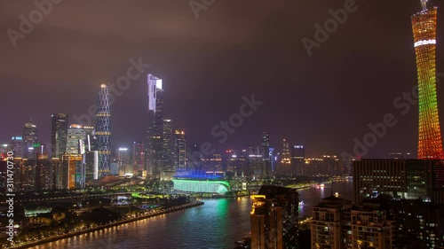 Wallpaper Mural Guangzhou night business city aerial cityscape China Pearl river with boats traffic and bridges timelapse pan up Torontodigital.ca