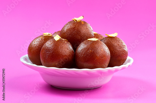 Indian Dessert : Gulab Jamun in white bowl