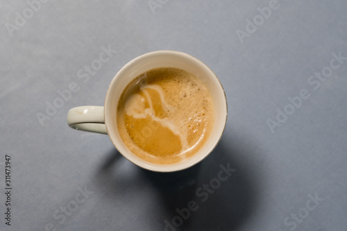 top view of a cup of coffee and milk