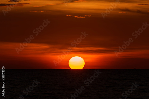 Fototapeta Naklejka Na Ścianę i Meble -  Big sun with sky background on sunrise in the morning..