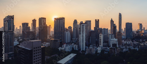 sunset rooftop view skyline panoramic twilight, office buildings, living, condominium in bangkok city skyline top view Downtown and business office bank financial in capital city of thailand asian © anuchit2012