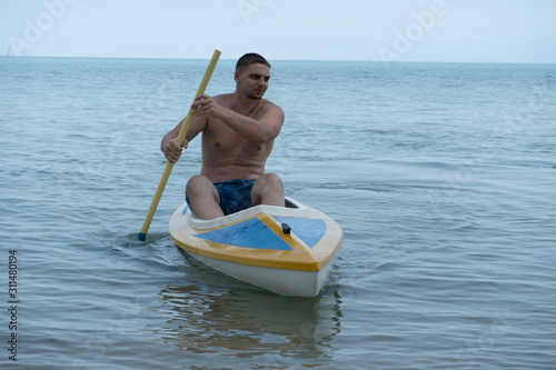 man on kayak © avtk