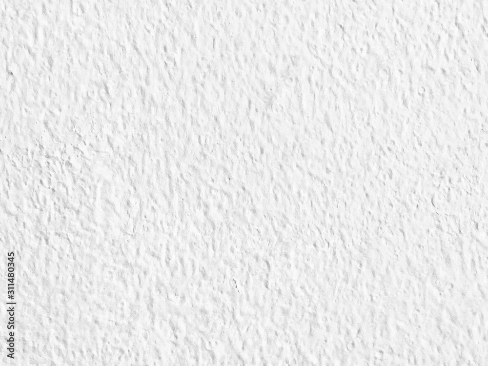 White concrete cement wall textured. Can be use for backdrop or background. Copy space for any text design.