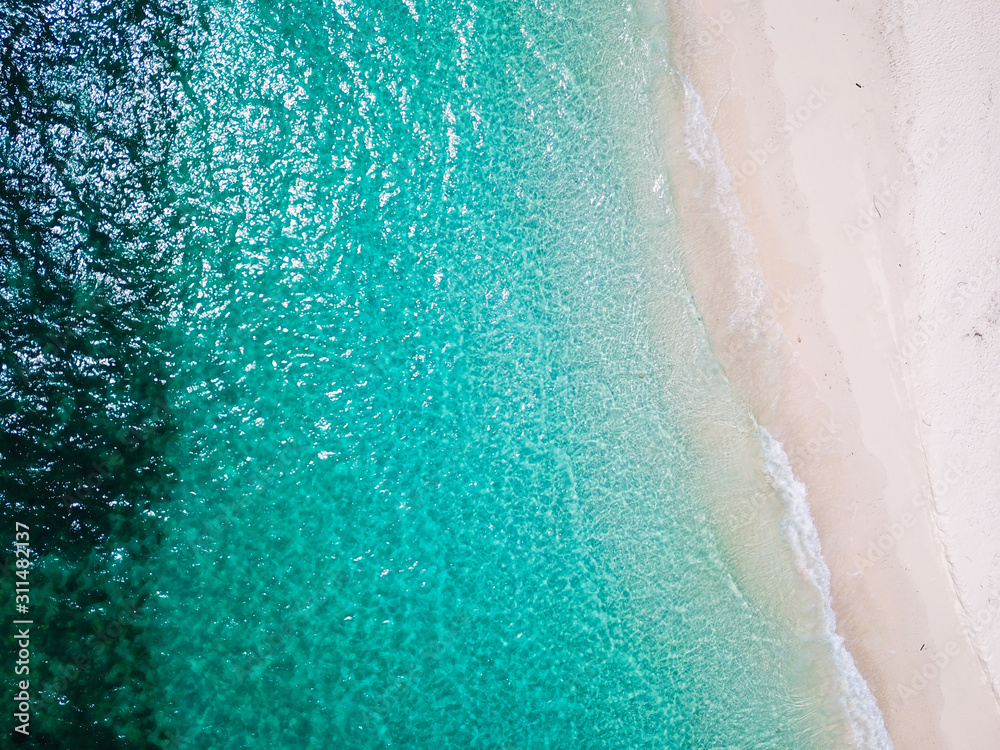 aerial view of beautiful beach and clear water