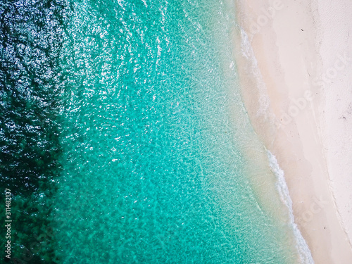 aerial view of beautiful beach and clear water