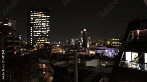 Wallpaper Mural TOKYO, JAPAN - February 5, 2019: Photo of Japan apartment buildings and homes at night. Japan hosts 2020 Olympics. Torontodigital.ca