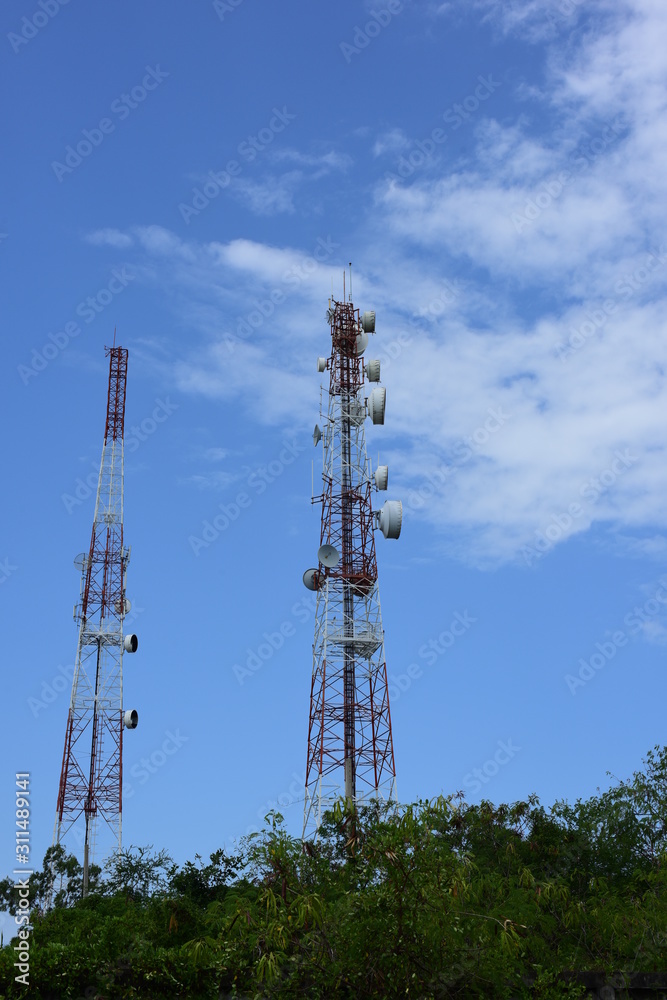 .Wireless Communication Antenna With bright sky.Telecommunication tower with antennas.High pole for signal transmission.