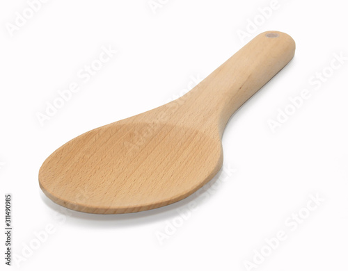wooden brown spoon in isolated on white background