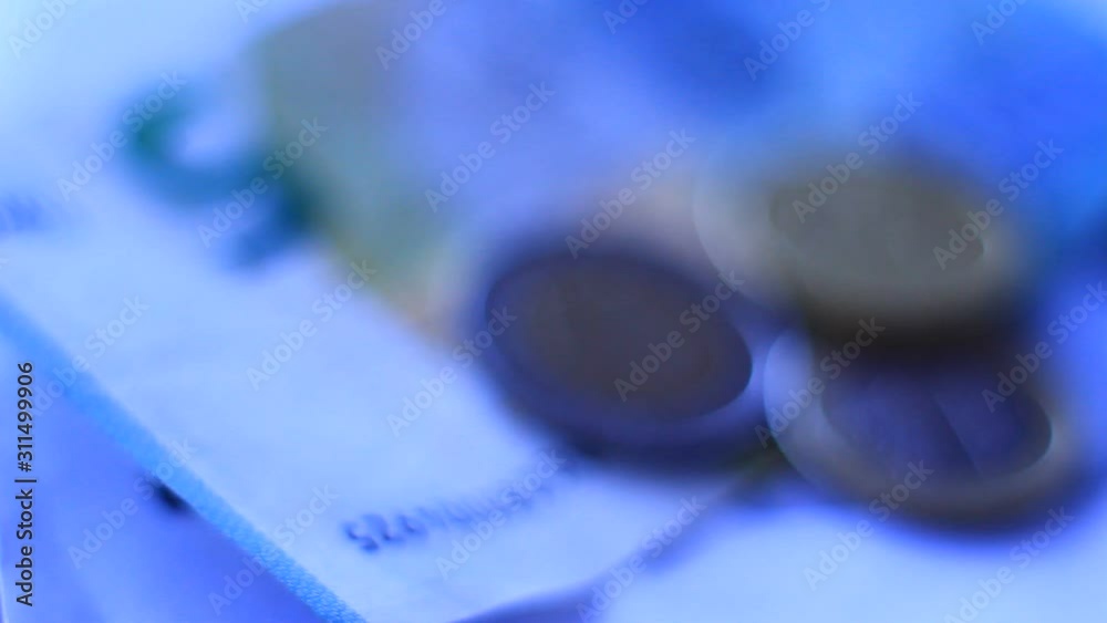Euro paper money, coins. Macro presentation. Close up. Euro paper money, coins. Macro presentation. Close up.