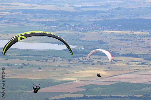 Paragliders flying from Dobrostan in Bulgaria	 photo