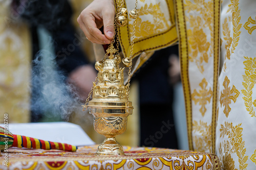 Obraz na plátně Details with a golden metallic christian orthodox frankincense burner, or censer