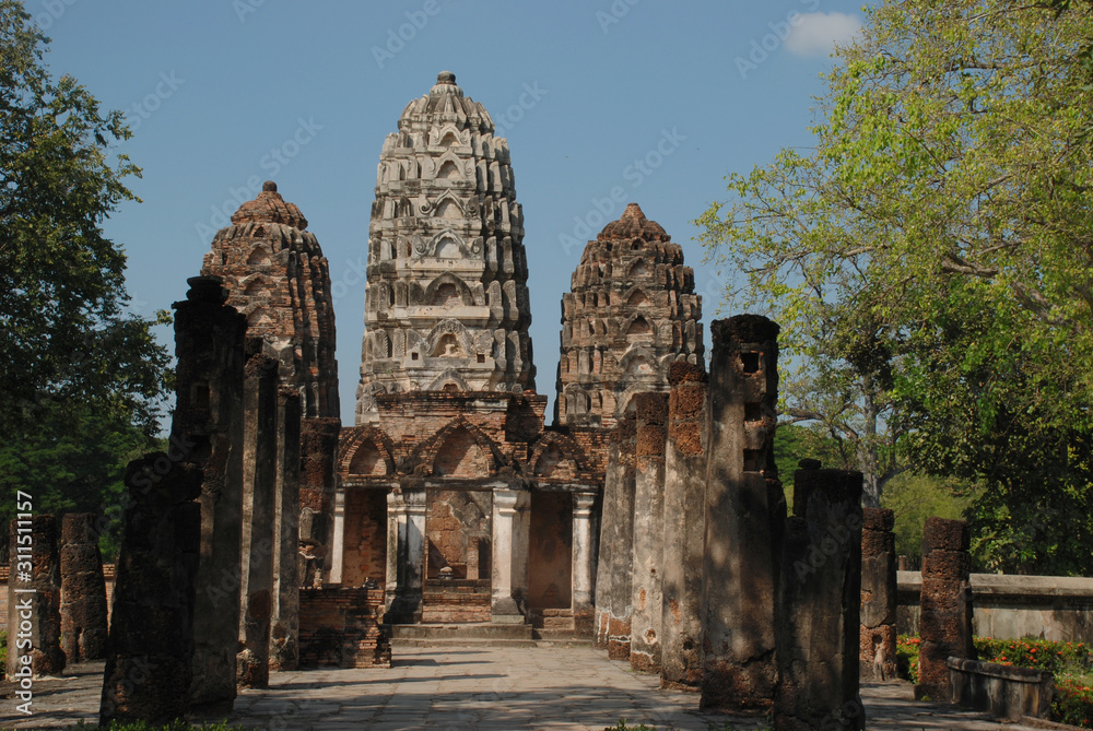Three pagodas at the front have laterite pillars.