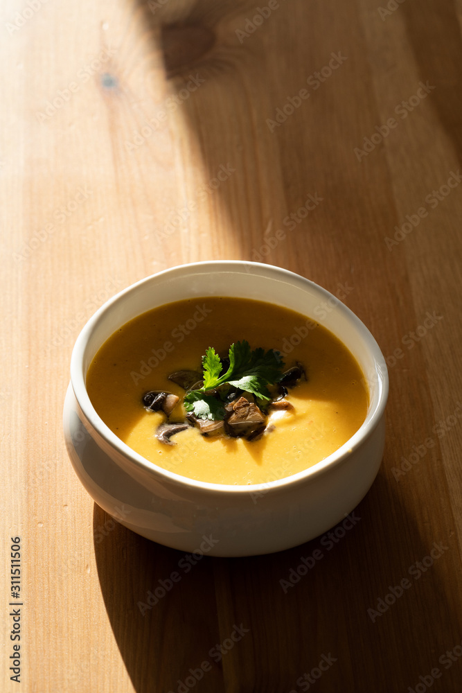 Homemade Thai Sweet Potato Soup with Cilantro, Coconut Milk Cream, Lime and Mushrooms. Homemade Thai Sweet Potato Soup with Cilantro, Coconut Milk Cream, Lime and Mushrooms.