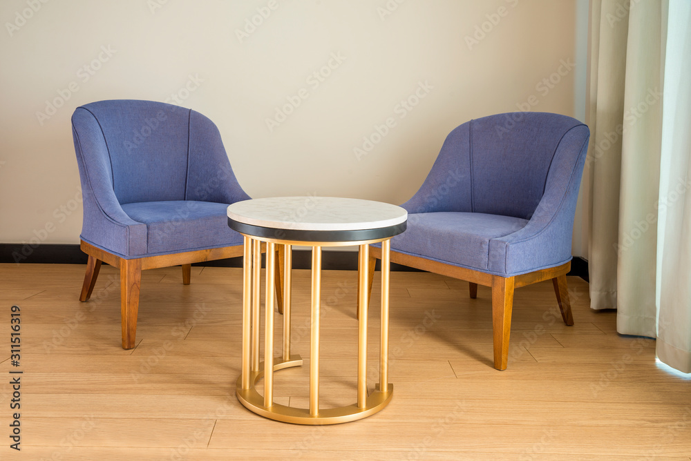 Colored chairs from fabric and suede on a laminate floor Colored chairs from fabric and suede on a laminate floor