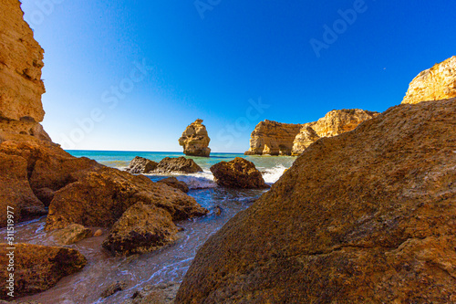 Panoramic view on cliffy Algarve coast in Portugal in summer