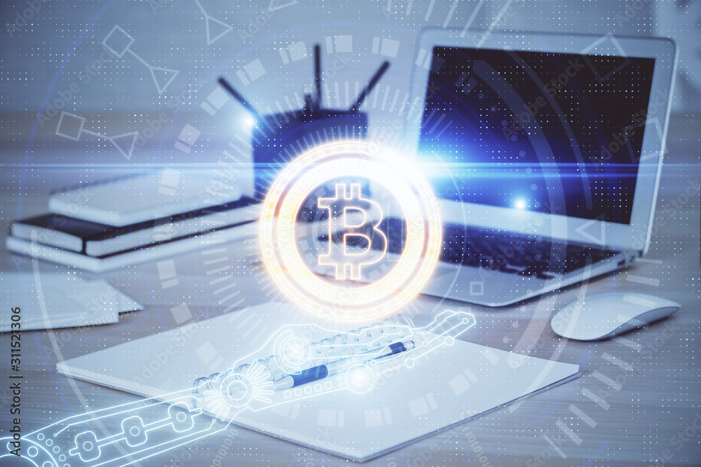 Multi exposure of blockchain theme hologram and table with computer background. Concept of bitcoin crypto currency. Multi exposure of blockchain theme hologram and table with computer background. Concept of bitcoin crypto currency.