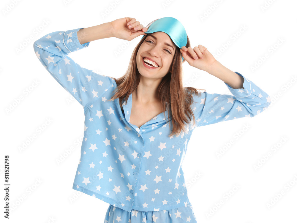 Beautiful woman wearing pajamas and sleep mask on white background. Bedtime Beautiful woman wearing pajamas and sleep mask on white background. Bedtime