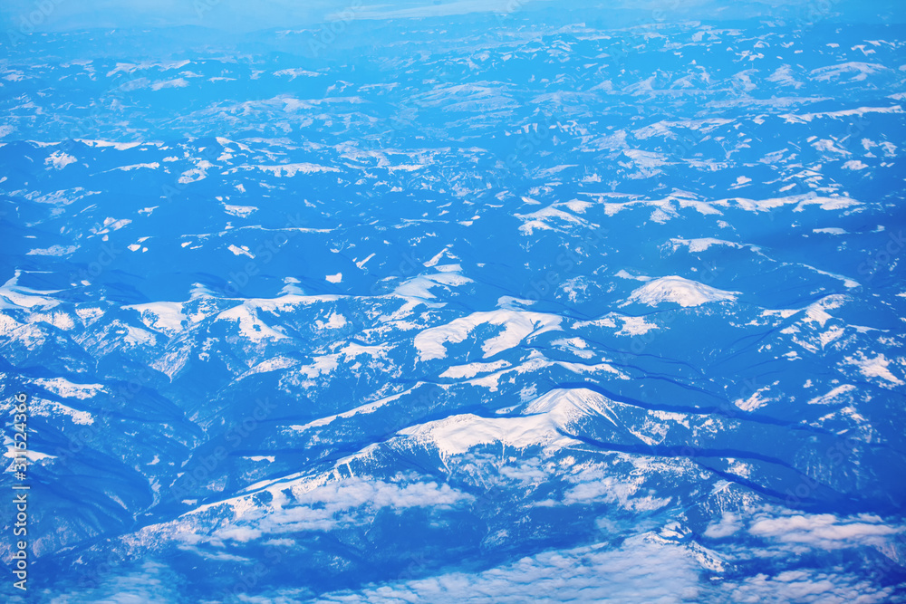 aerial view of mountains covered by snow